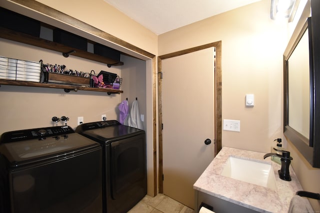 143 Pine Hill Rd Unit 8B, Thomaston, CT 06787 - laundry room featuring a sink, independent washer and dryer, and light tile patterned floors