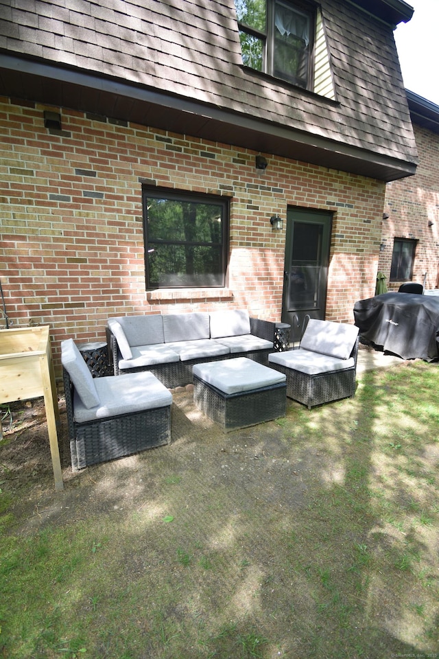 143 Pine Hill Rd Unit 8B, Thomaston, CT 06787 - back of house with outdoor lounge area, brick siding, and roof with shingles