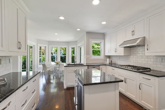 7 Sherwood Farms Ln, Westport, CT 06880 - kitchen with under cabinet range hood, appliances with stainless steel finishes, a sink, beverage cooler, and white cabinets