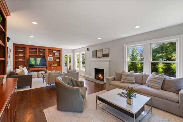 7 Sherwood Farms Ln, Westport, CT 06880 - living room featuring a fireplace, dark wood-type flooring, and recessed lighting