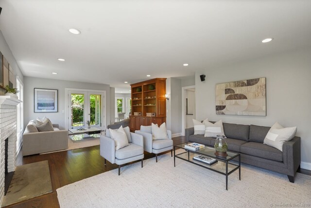 7 Sherwood Farms Ln, Westport, CT 06880 - living room featuring a fireplace, recessed lighting, wood finished floors, and baseboards