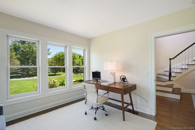 7 Sherwood Farms Ln, Westport, CT 06880 - office featuring plenty of natural light, baseboards, and wood finished floors