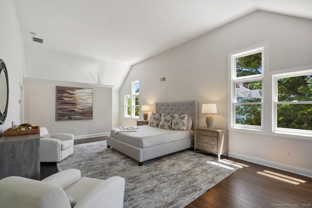 7 Sherwood Farms Ln, Westport, CT 06880 - bedroom with vaulted ceiling, wood finished floors, and baseboards