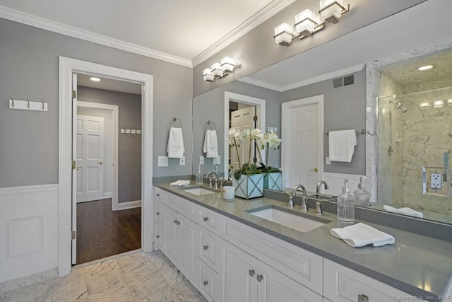 7 Sherwood Farms Ln, Westport, CT 06880 - full bathroom featuring marble look tiles, a marble finish shower, double vanity, crown molding, and baseboards