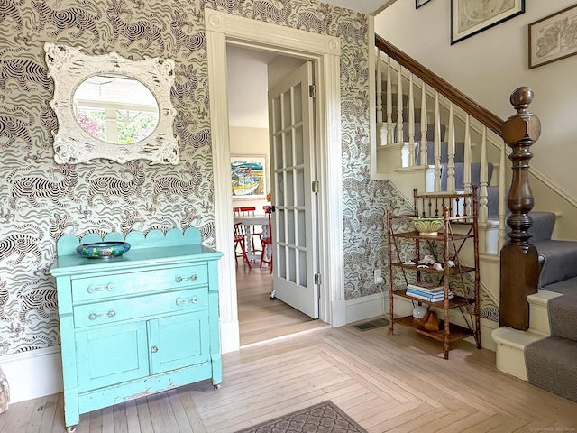 37 Orchard St, Stonington, CT 06378 - interior space with wallpapered walls, wood finished floors, and baseboards