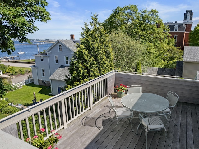37 Orchard St, Stonington, CT 06378 - wooden terrace with a water view, outdoor dining area, and a lawn