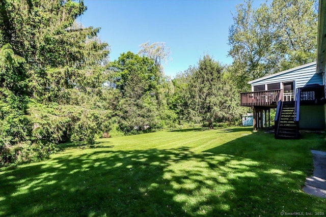 8 Prospect Ct, Brookfield, CT 06804 - view of green lawn with stairs and a wooden deck