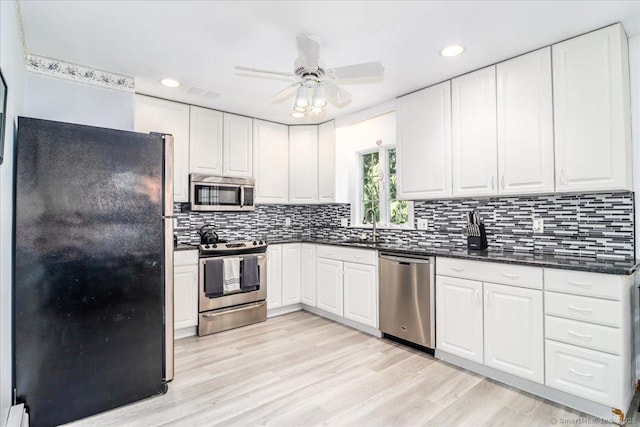 8 Prospect Ct, Brookfield, CT 06804 - kitchen featuring appliances with stainless steel finishes, a ceiling fan, light wood finished floors, recessed lighting, and backsplash