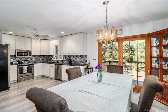 8 Prospect Ct, Brookfield, CT 06804 - dining space featuring a chandelier, light wood-type flooring, ceiling fan, and recessed lighting