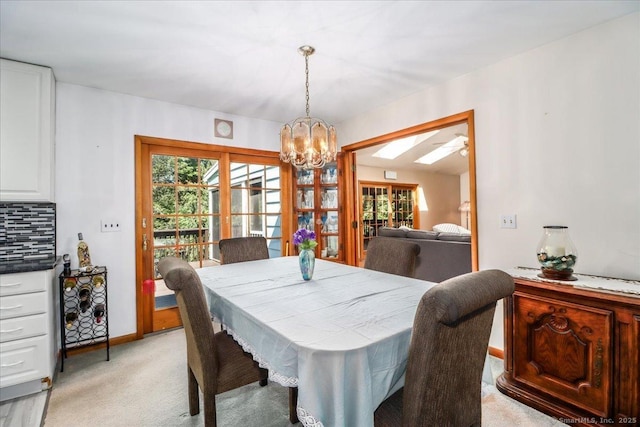 8 Prospect Ct, Brookfield, CT 06804 - dining space featuring light colored carpet, a chandelier, and ceiling fan