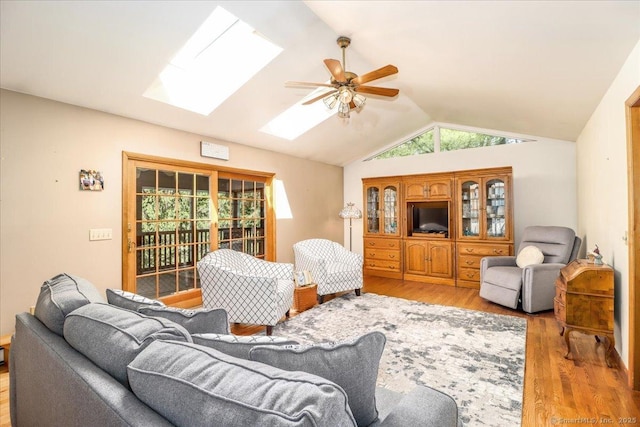 8 Prospect Ct, Brookfield, CT 06804 - living area with a skylight, ceiling fan, vaulted ceiling, and light wood finished floors