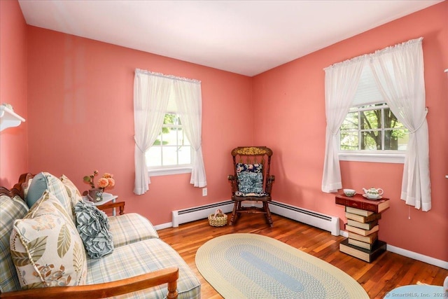 8 Prospect Ct, Brookfield, CT 06804 - living area featuring wood finished floors, baseboard heating, and baseboards