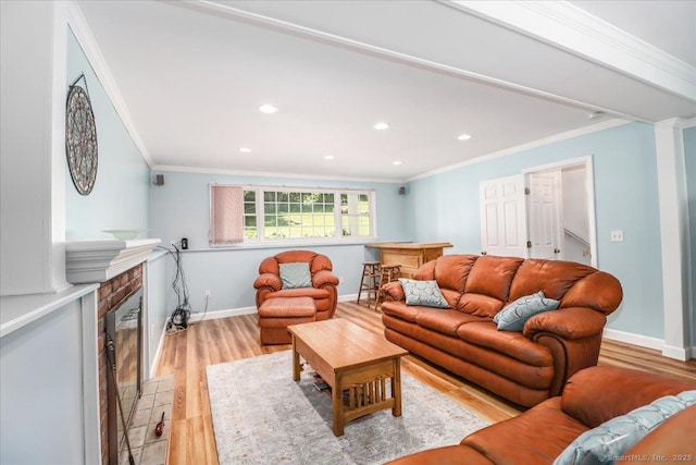 8 Prospect Ct, Brookfield, CT 06804 - living area with light wood finished floors, ornamental molding, recessed lighting, a fireplace, and baseboards
