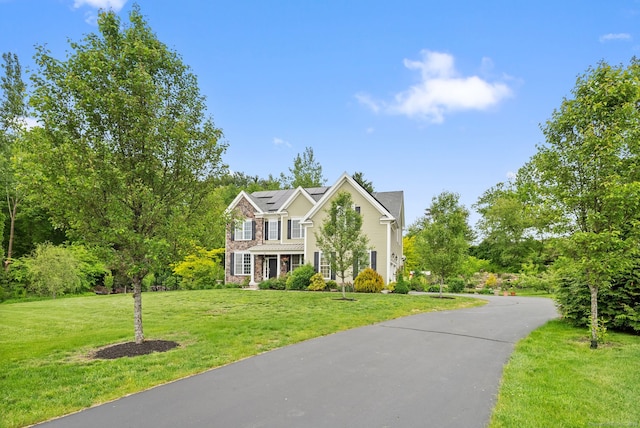 100 Pembroke Ter, Glastonbury, CT 06033 - traditional home with solar panels and a front lawn