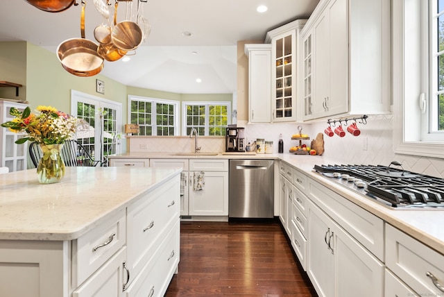 100 Pembroke Ter, Glastonbury, CT 06033 - kitchen with appliances with stainless steel finishes, a sink, dark wood-style floors, decorative backsplash, and recessed lighting