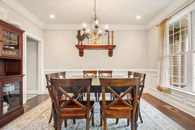 100 Pembroke Ter, Glastonbury, CT 06033 - dining room with a chandelier, wood finished floors, ornamental molding, a wainscoted wall, and recessed lighting