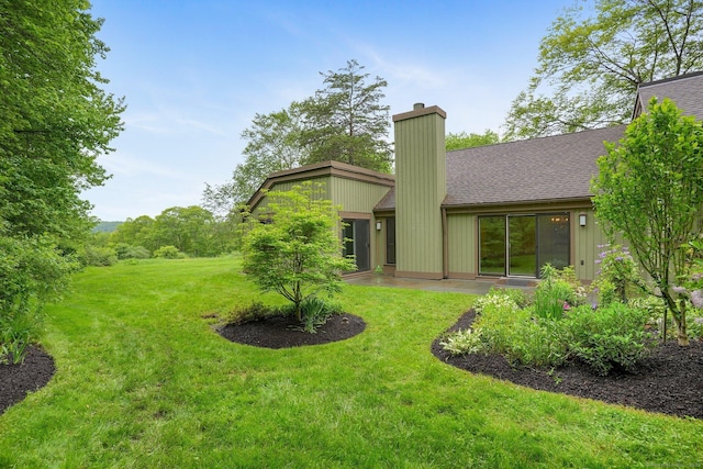 738 Heritage Vlg Unit B, Southbury, CT 06488 - view of green lawn with a patio