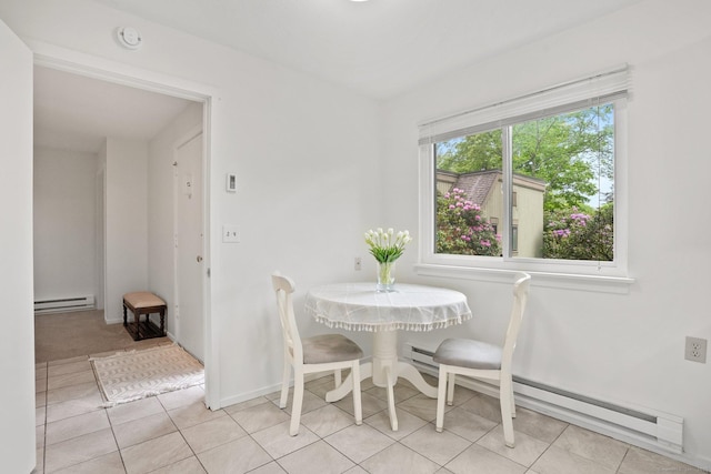 738 Heritage Vlg Unit B, Southbury, CT 06488 - dining space with a baseboard heating unit and light tile patterned floors