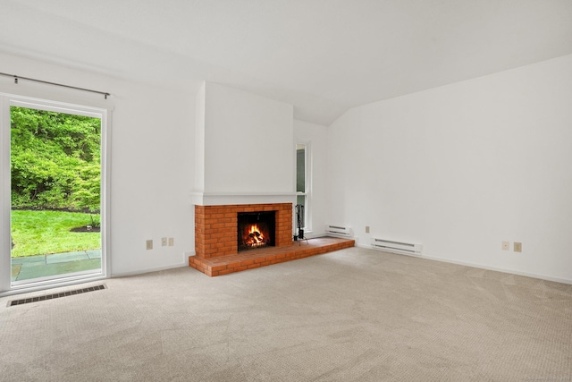 738 Heritage Vlg Unit B, Southbury, CT 06488 - unfurnished living room with a baseboard radiator, baseboard heating, carpet, a fireplace, and lofted ceiling