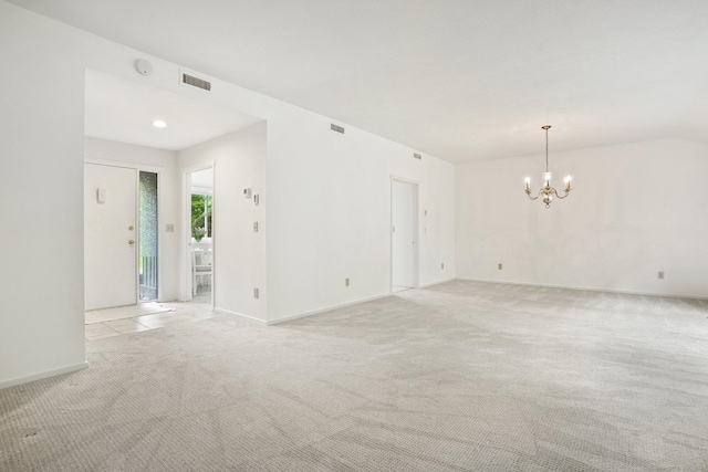 738 Heritage Vlg Unit B, Southbury, CT 06488 - spare room featuring light colored carpet, a chandelier, baseboards, and a smoke detector