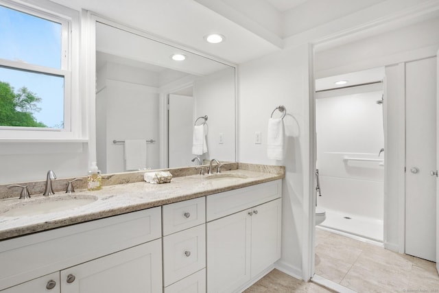 738 Heritage Vlg Unit B, Southbury, CT 06488 - bathroom featuring double vanity, toilet, and recessed lighting