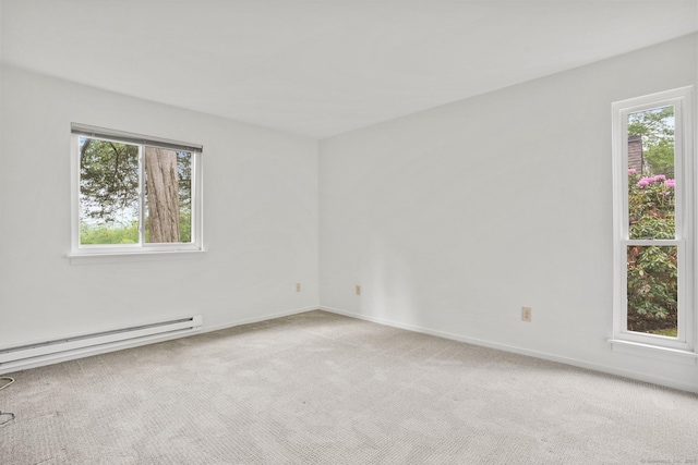 738 Heritage Vlg Unit B, Southbury, CT 06488 - unfurnished room with baseboard heating, plenty of natural light, carpet flooring, and baseboards