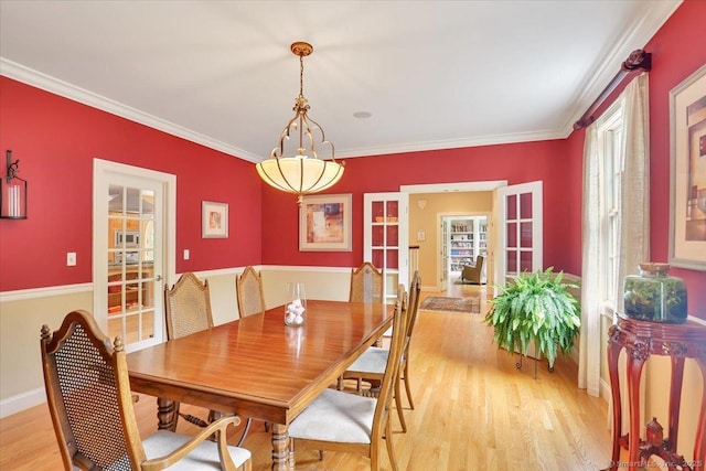 15 Surrey Ridge Rd, Killingworth, CT 06419 - dining space featuring french doors, light wood-style flooring, crown molding, and baseboards