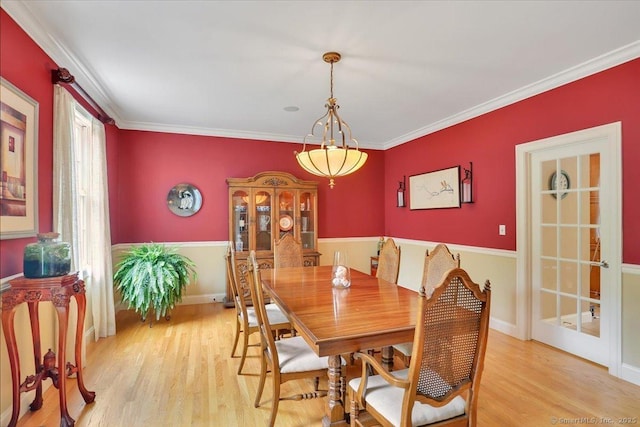 15 Surrey Ridge Rd, Killingworth, CT 06419 - dining area with light wood-style flooring, crown molding, and baseboards