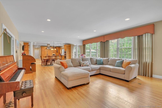 15 Surrey Ridge Rd, Killingworth, CT 06419 - living area with ornate columns, light wood-style floors, and recessed lighting