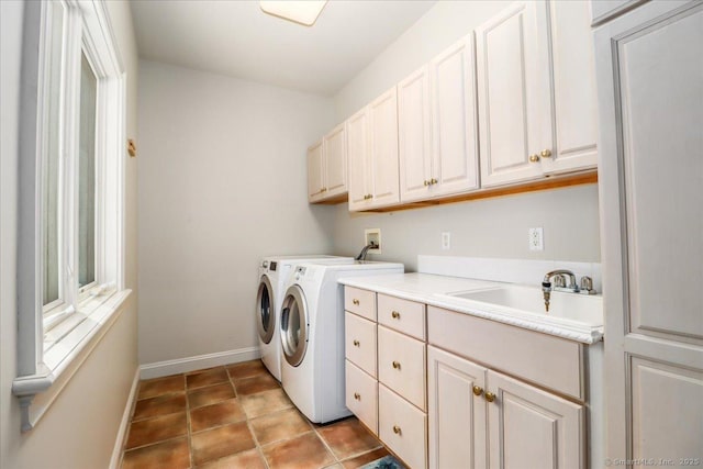 12 Fox Run, Sherman, CT 06784 - washroom featuring cabinet space, washing machine and dryer, baseboards, and tile patterned flooring