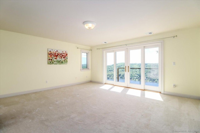 12 Fox Run, Sherman, CT 06784 - unfurnished room featuring french doors, light colored carpet, and baseboards
