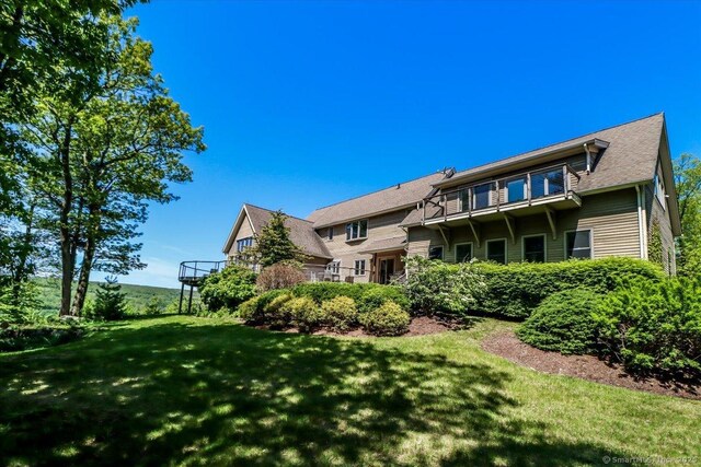 12 Fox Run, Sherman, CT 06784 - rear view of house with a lawn and a balcony