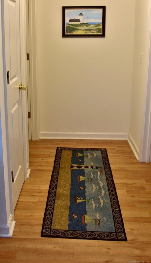 333 W Ave Unit 4, Milford, CT 06461 - hall featuring light wood-style flooring and baseboards