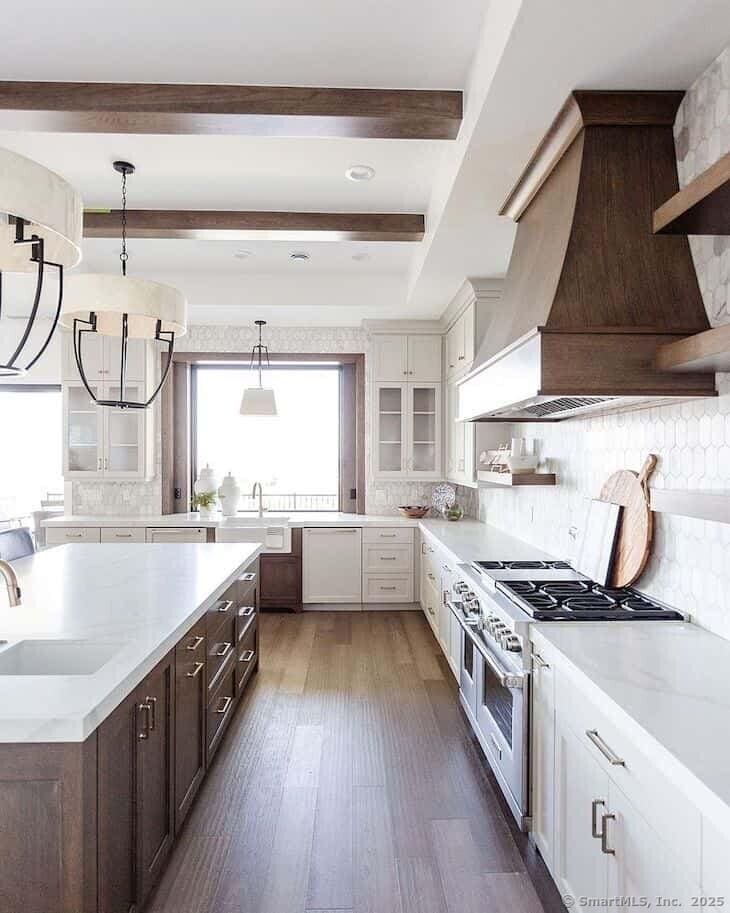 15 Rocco Dr, East Lyme, CT 06333 - kitchen featuring double oven range, open shelves, a sink, dishwashing machine, and beamed ceiling