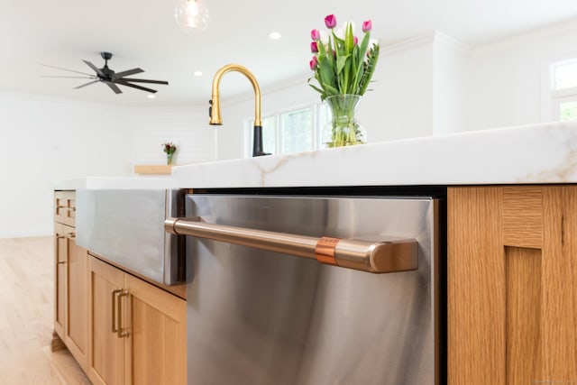 81 Nelson Dr, Burlington, CT 06013 - kitchen view of stainless steel dishwasher, ornamental molding, light wood-style flooring, ceiling fan, and recessed lighting