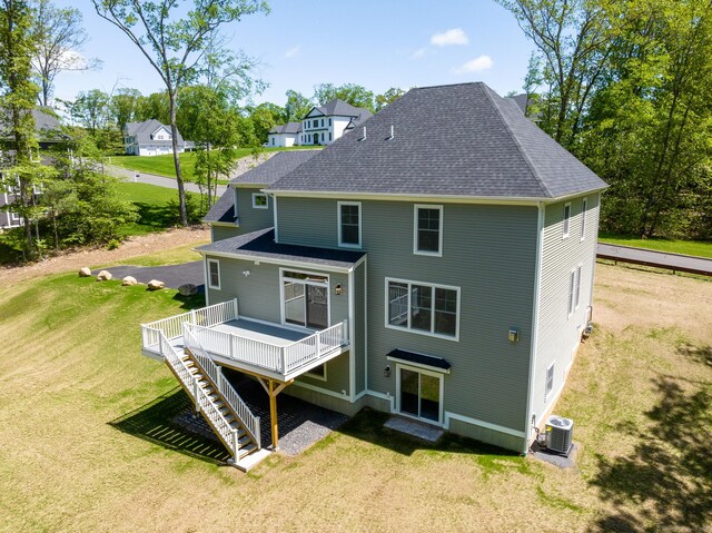 81 Nelson Dr, Burlington, CT 06013 - rear view of house featuring a deck, a yard, cooling unit, roof with shingles, and stairs