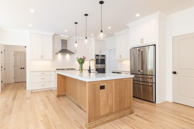 81 Nelson Dr, Burlington, CT 06013 - kitchen with appliances with stainless steel finishes, wall chimney range hood, backsplash, light countertops, and light wood-style floors