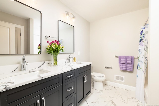 81 Nelson Dr, Burlington, CT 06013 - bathroom featuring double vanity, toilet, marble look tile flooring, baseboards, and shower / bath combination with curtain