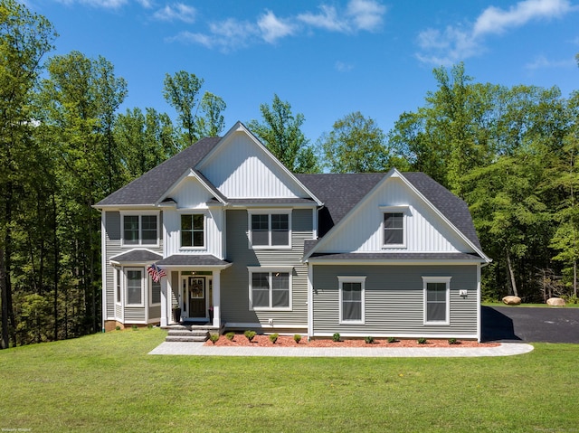 81 Nelson Dr, Burlington, CT 06013 - view of front facade with a shingled roof and a front lawn