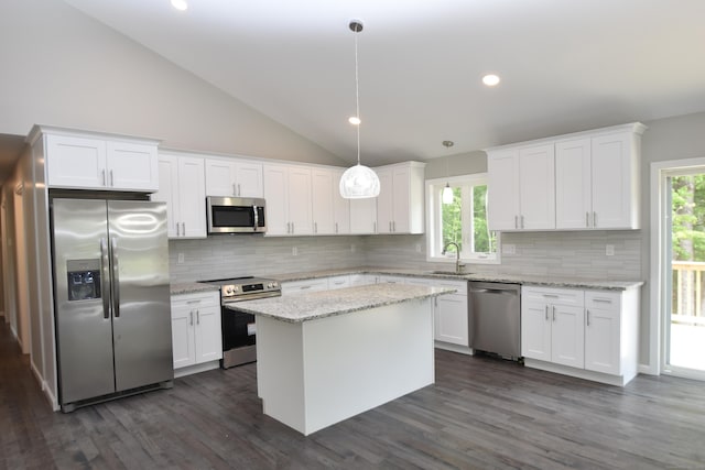 252 Plains Rd, Tolland, CT 06084 - kitchen with appliances with stainless steel finishes, a sink, lofted ceiling, white cabinets, and plenty of natural light
