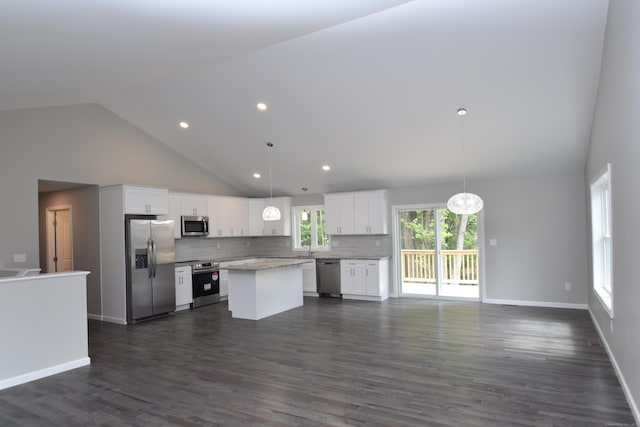 252 Plains Rd, Tolland, CT 06084 - kitchen with stainless steel appliances, high vaulted ceiling, open floor plan, white cabinets, and backsplash