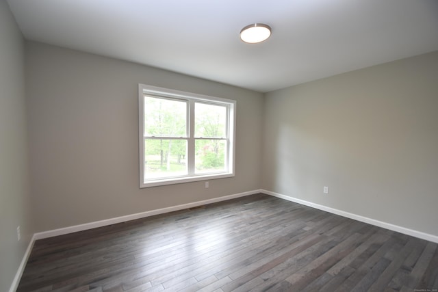 252 Plains Rd, Tolland, CT 06084 - spare room featuring dark wood finished floors and baseboards