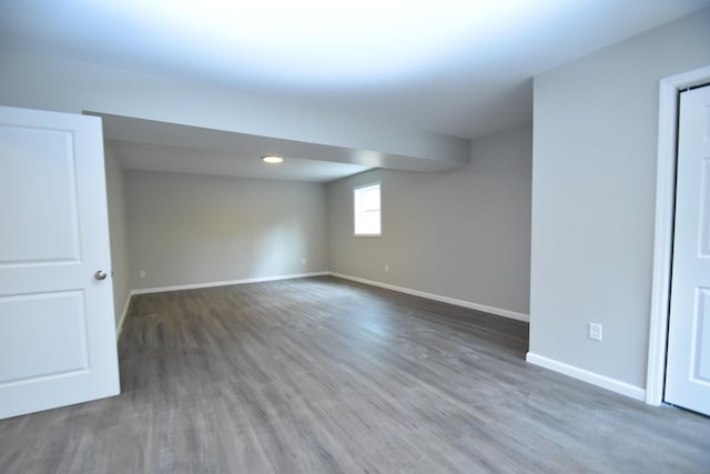 252 Plains Rd, Tolland, CT 06084 - below grade area featuring wood finished floors and baseboards