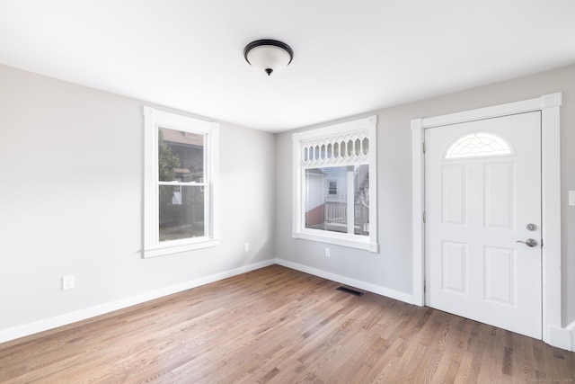 33 Prince St, Bristol, CT 06010 - entrance foyer featuring wood finished floors and baseboards