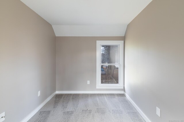 33 Prince St, Bristol, CT 06010 - carpeted spare room featuring baseboards and lofted ceiling