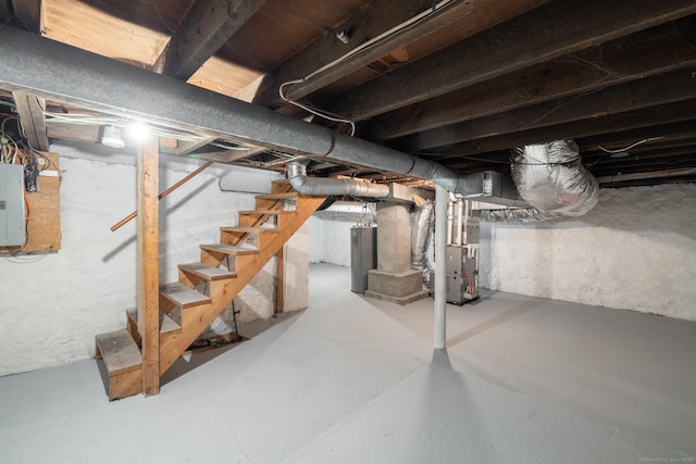 33 Prince St, Bristol, CT 06010 - unfinished below grade area with stairway, heating unit, and electric panel