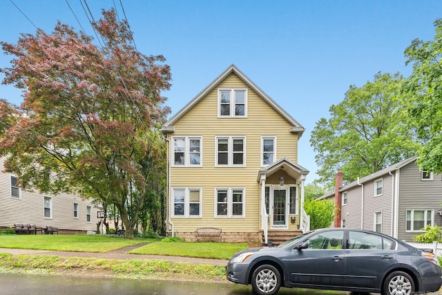43 Russell St, Hamden, CT 06517 - traditional-style house featuring a front lawn