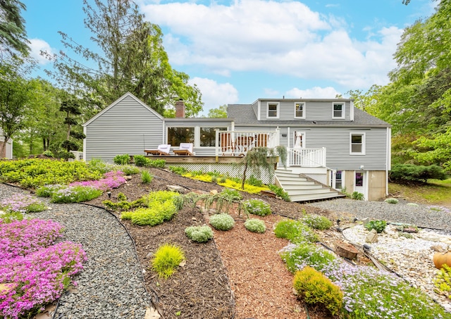 1 Russell Ln, Simsbury, CT 06070 - rear view of house featuring a wooden deck, stairs, roof with shingles, and a chimney