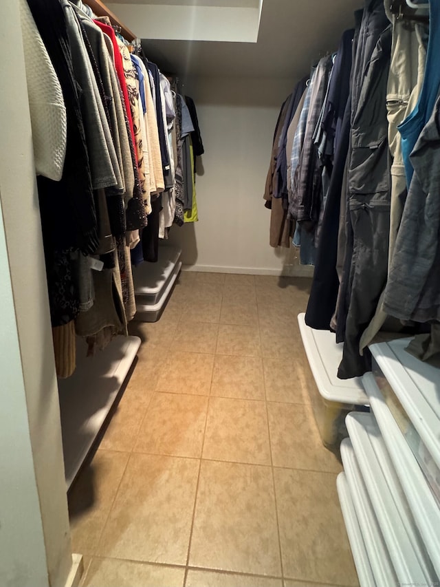 1 Russell Ln, Simsbury, CT 06070 - walk in closet featuring tile patterned flooring