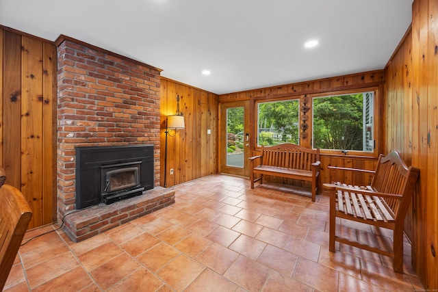 1 Russell Ln, Simsbury, CT 06070 - living area with wooden walls, recessed lighting, and light stone finish flooring